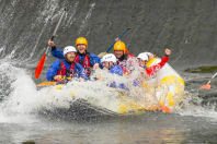 A stag group rafting in  river