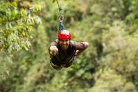 A man on a zip line wire