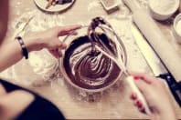 A woman taking a chocolate making class