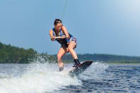 a woman wakeboarding