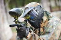 A group of people having fun playing paintball