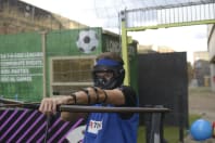 A man playing combat archery