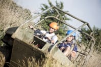 An image of a man on a argocat vehicle