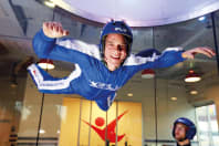 A man indoor skydiving