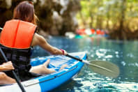 A member of a hen party kayaking