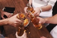 A group of guys drinking beers