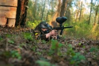 A group of people enjoying a game of paintball