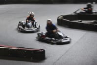 A group racing go karts around a track