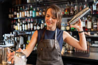 A woman making cocktails on a hen party