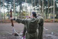 A group doing archery