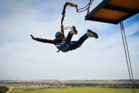 A woman doing a bungee jump