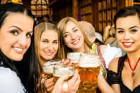A group of attractive women in a Bavarian beer house