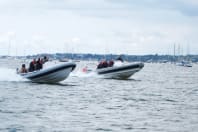 power boats going through the sea