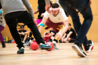 A man playing dodgeball