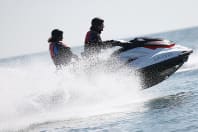 Two women having fun on a jetski