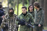 a stag group play a game of laser tag