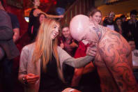 A member of a hen party with a male stripper