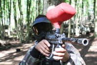 A group of people having fun playing paintball