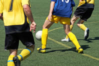 A group of men playing football