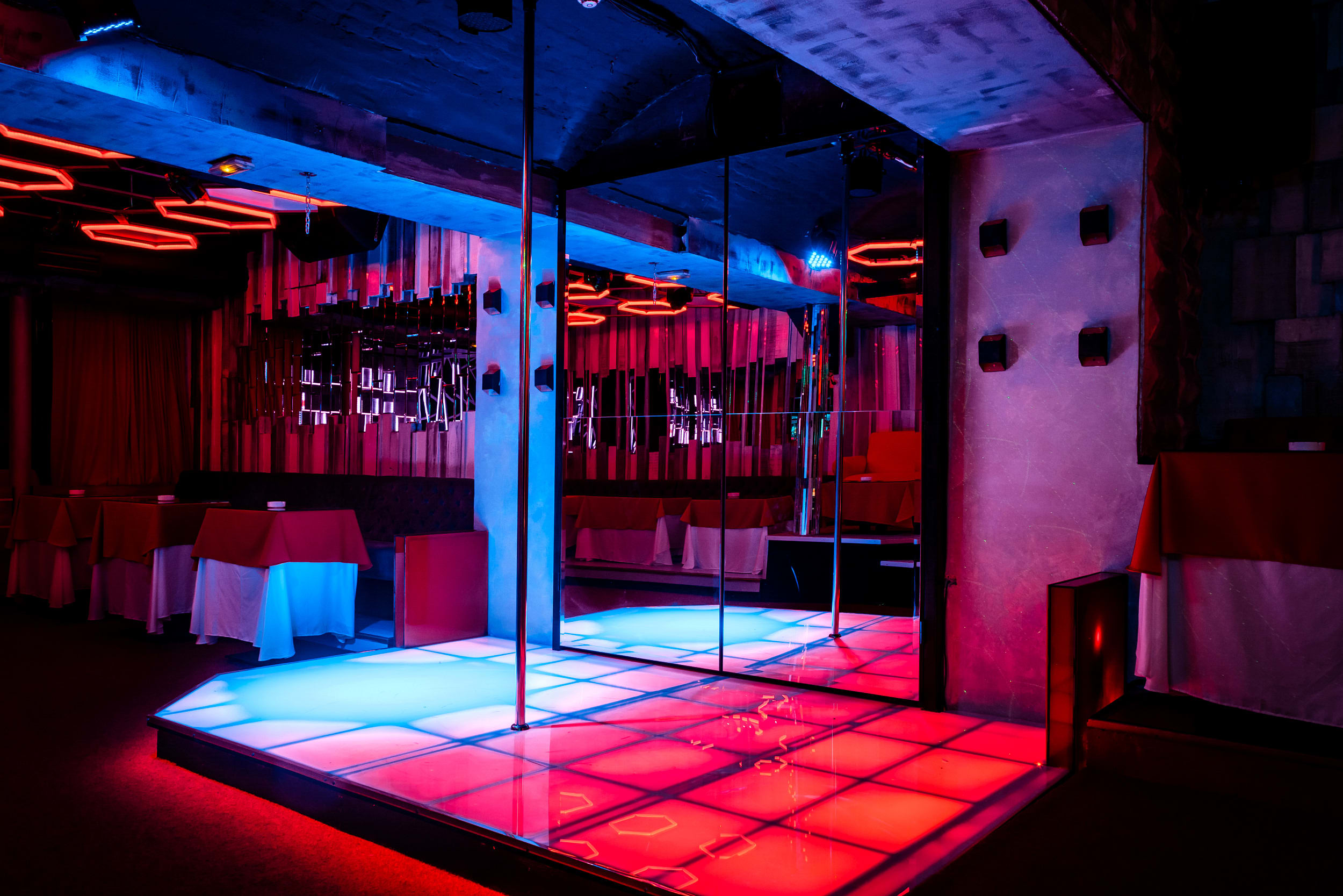 Pole stage in lap dance club.jpg