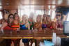 A hen group having fun on a boat party