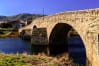 Roman bridge of 125 meters long built on the river Tormes in the town "El Barco de Ávila" in Spain