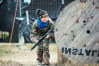 A woman playing airsoft