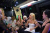 Women having fun on a party bus