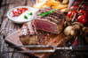 A plate of steak and chips