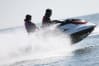 Two women having fun on a jetski