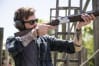 A man clay pigeon shooting