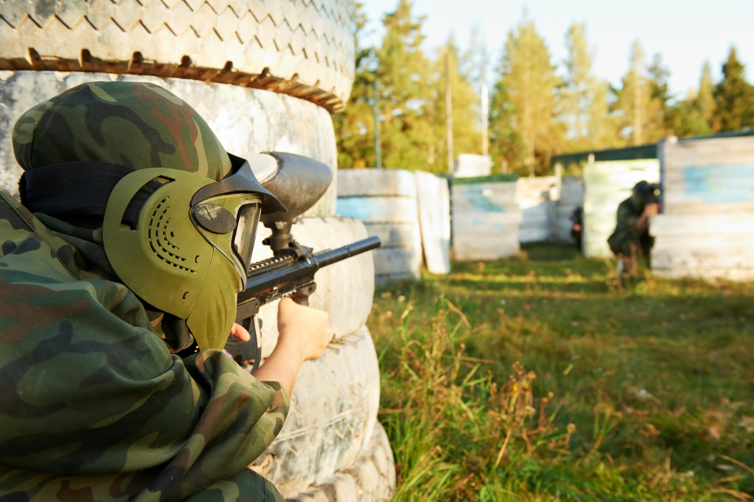 A group of people enjoying a game of paintball