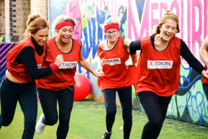 A group of girls having fun at a school sports day