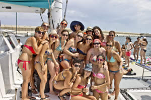 An attractive hen group celebrating on a party boat