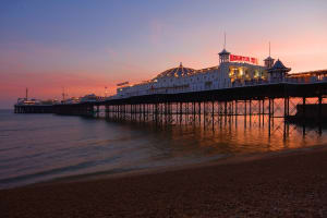 Brighton beach in the evening with the pier
