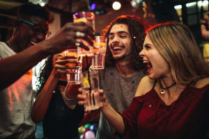 group of friends drinking in nightclub