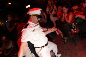a male stripper performing for a hen party