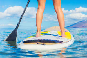 A woman on a paddle board