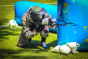 A group of people enjoying a game of paintball
