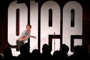 Glee Club Cardiff - Russell Howard performing on stage