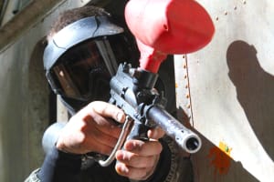 A man playing paintball