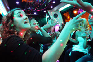 A hen party celebrating on a party bus