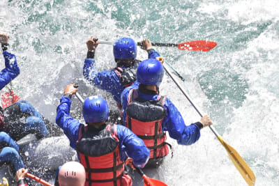 A group white water rafting