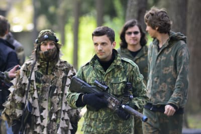 A group of guys playing laser mission