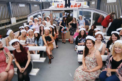 a smiling happy on group on a party boat