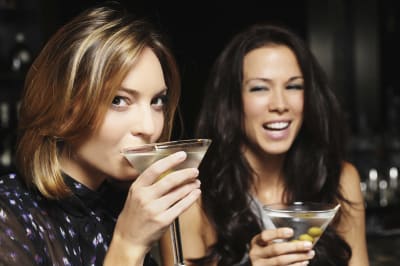 Two women enjoying a cocktail
