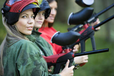 A group of women paintballing