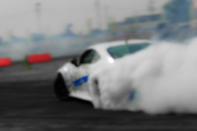 A car speeding around a racetrack
