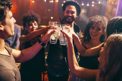 group of friends drinking in nightclub