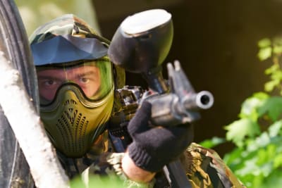 stag having fun playing paintball